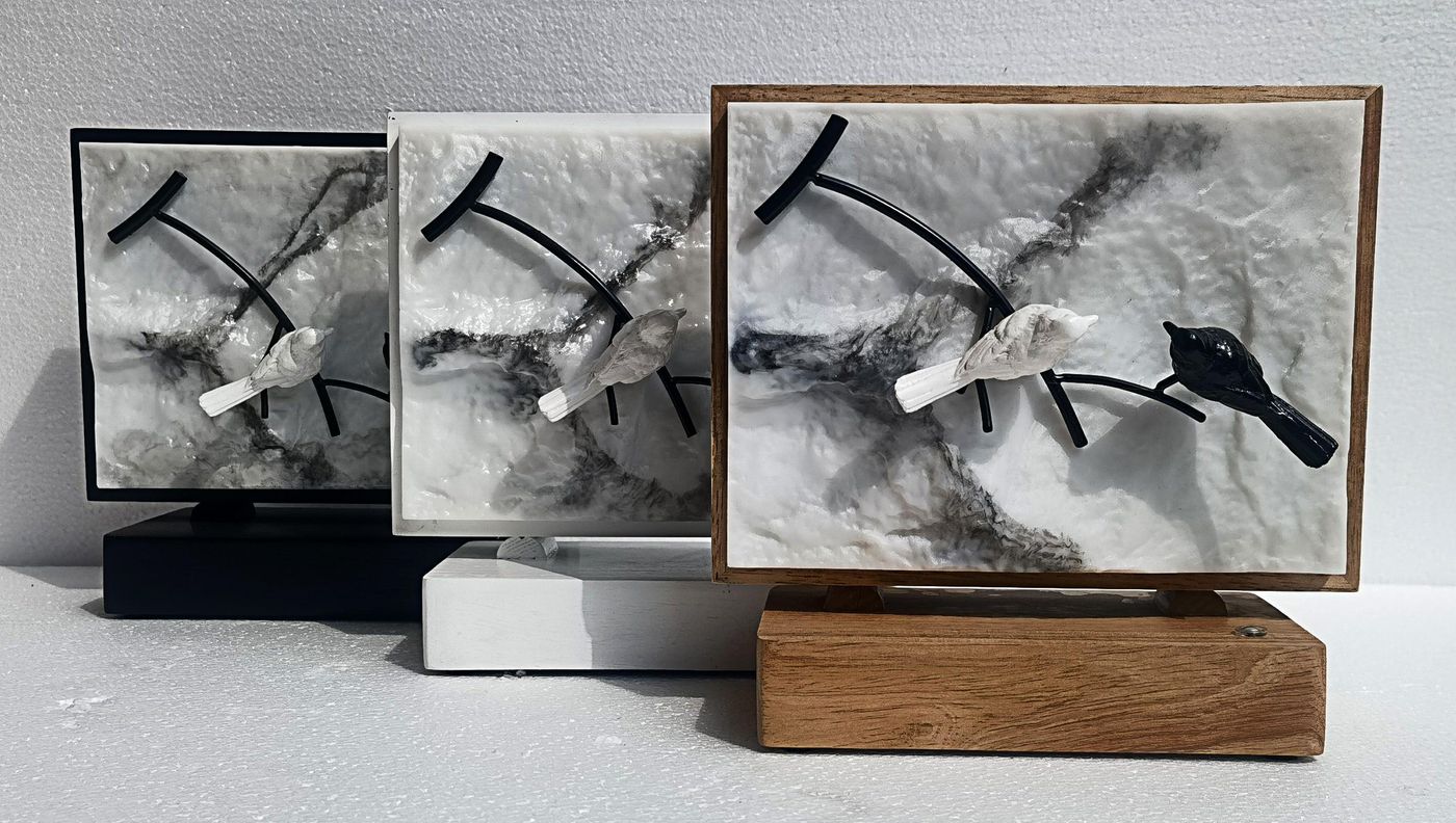 Wood carved bird wall art