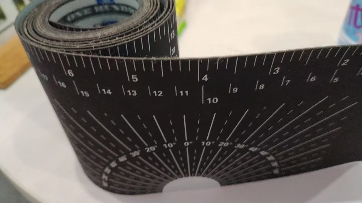 Flexible pipe measuring tool close-up